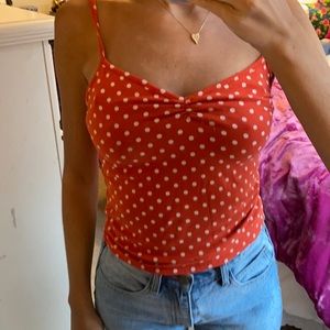 Orange and cream polka dot top
